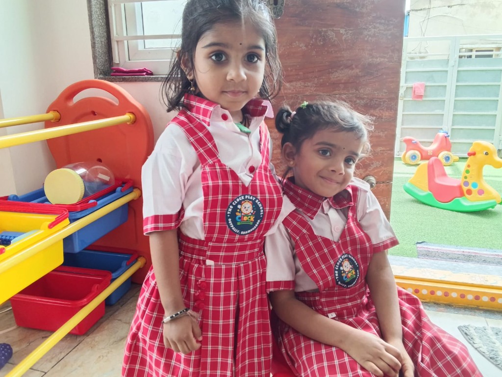 Students in school uniform at play area